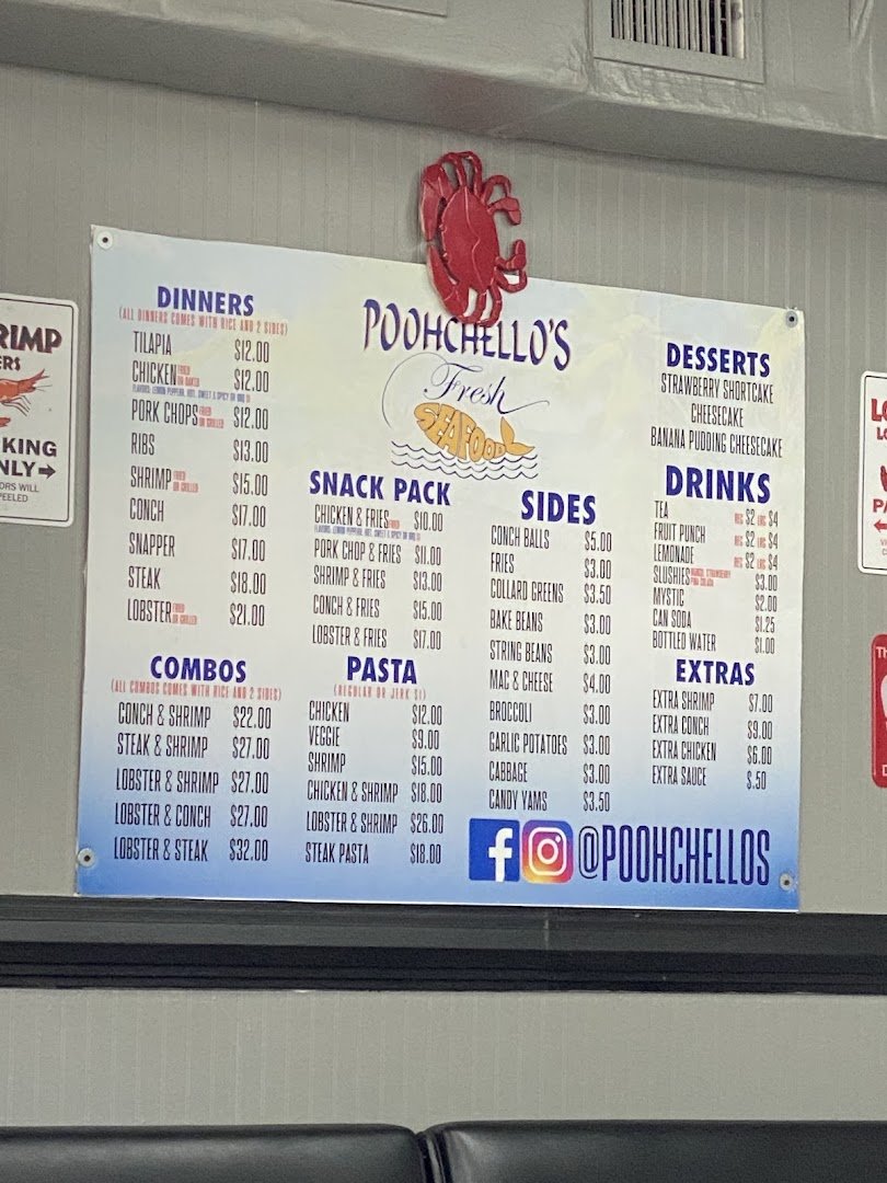 Plates of seafood and comfort food on a casual table.