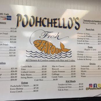 Menu board with breakfast, dinners, sides, and drinks.
